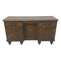 Victorian walnut scumbled pine sideboard, stepped rectangular top over central cupboard with marquetry inlay, flanked by two banks of three drawers fitted with round wooden knobs, raised on turned bun supports