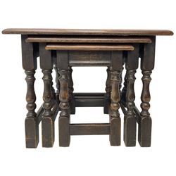 Mid-to-late 20th century medium oak nest of three occasional tables