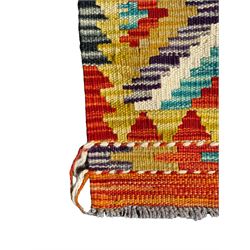 Chobi Kilim ground runner, the field decorated with a geometric pattern of coloured diamonds and triangles, each containing stylised motifs, the shorter ends enclosed by a plain border, and the longer sides with a multicoloured border

