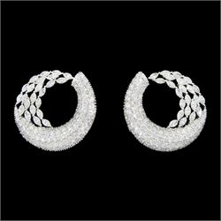 Pair of 18ct white gold marquise cut and pave set, round brilliant cut diamond crescent st...