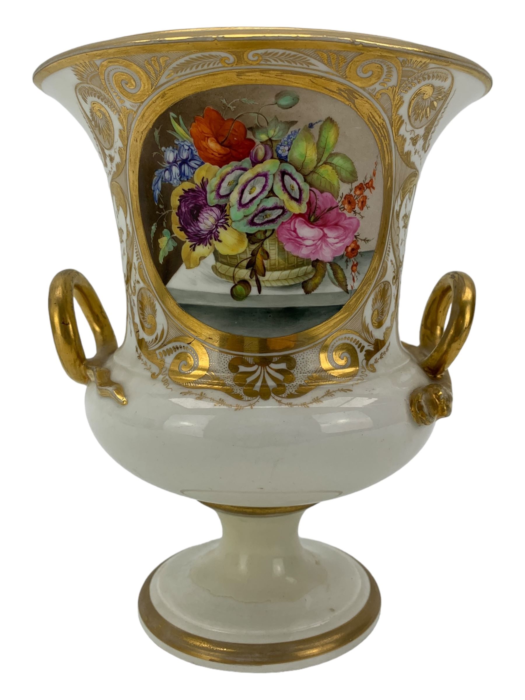 Early 19th century Derby vase, of campana urn form, decorated to one side with a hand painted reserve of a basket of flowers, within a scroll gilt border and twin serpent form handles, H20.5cm together with a Bloor Derby vase, hand painted with figures in a wooded landscape, with twin gilt swan form handles, upon a square pedestal foot, H25cm (2)