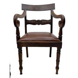 Set of six (4+2) early 19th century mahogany dining chairs, figured bar back over rose and curled leaf carved middle rail, drop-in seats upholstered in brown fabric, on turned front supports 