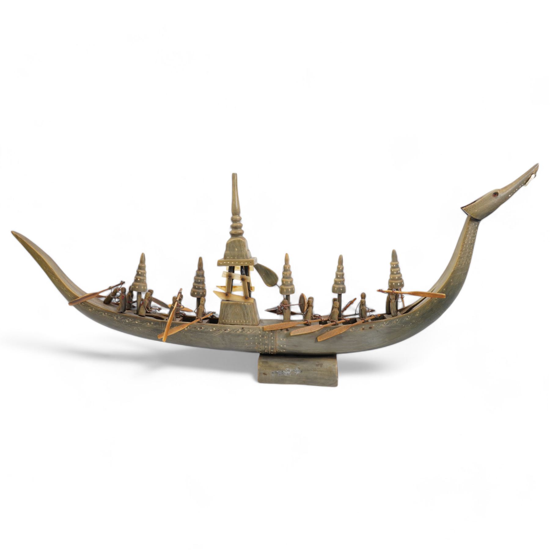 Asian carved horn dragon boat with multiple oarsmen, L63cm