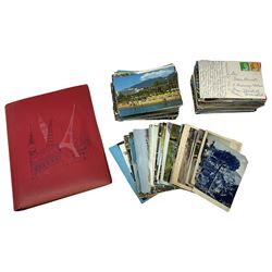 Quantity of postcards, mainly photographic design, loose and housed in book