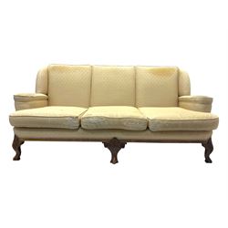 Late 20th century mahogany framed three seat sofa, upholstered in cream fabric with repeating cross pattern, raised on cabriole supports (W192cm, D98cm, H89cm); matching armchair in light pink fabric (W92cm, D98cm, H89cm) 