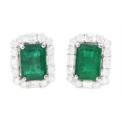 Pair of 18ct white gold emerald cut emerald, round brilliant and baguette cut diamond stud...