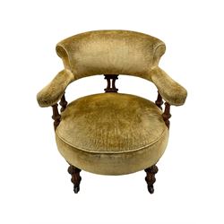 Victorian pair of mahogany armchairs, upholstered in gold velvet fabric, each with curved back, pierced splat and scroll arms, one with rounded seat and the other square, on turned front supports with castors