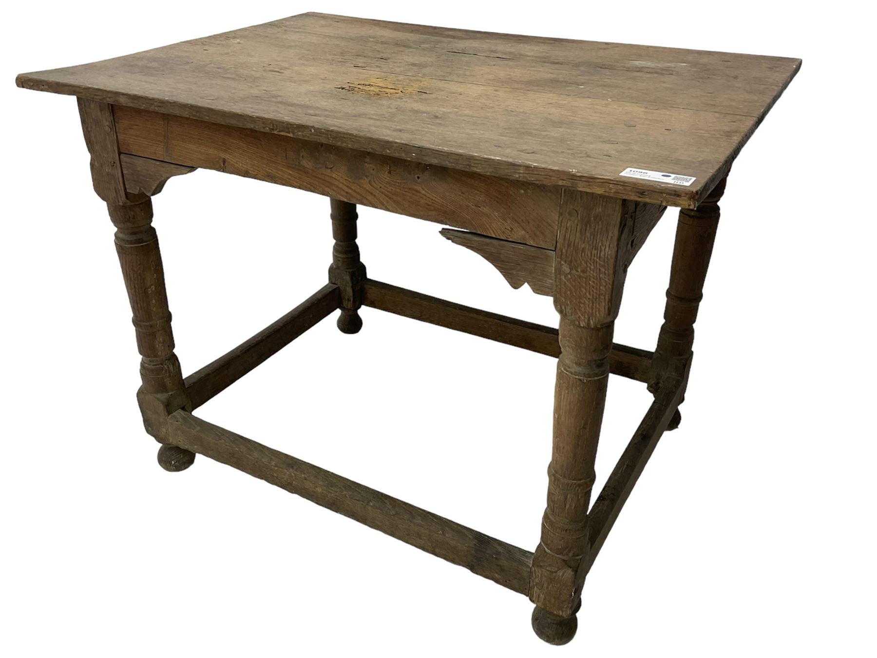 18th century oak joined table, rectangular pegged plank top on turned supports united by plain stretchers