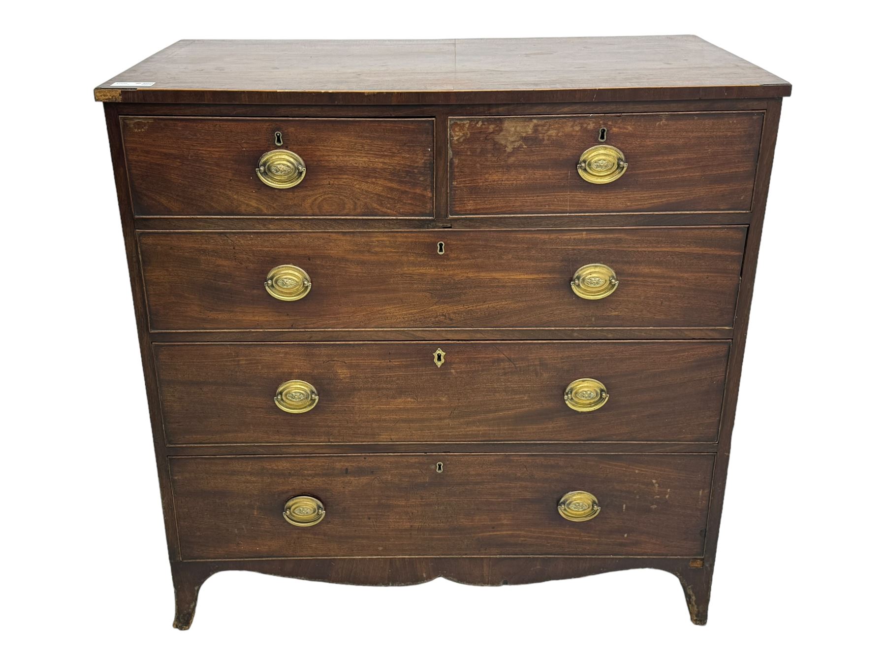 George III mahogany chest, rectangular cross banded top above two short and three long graduating cockbeaded drawers, shaped apron with splayed bracket feet