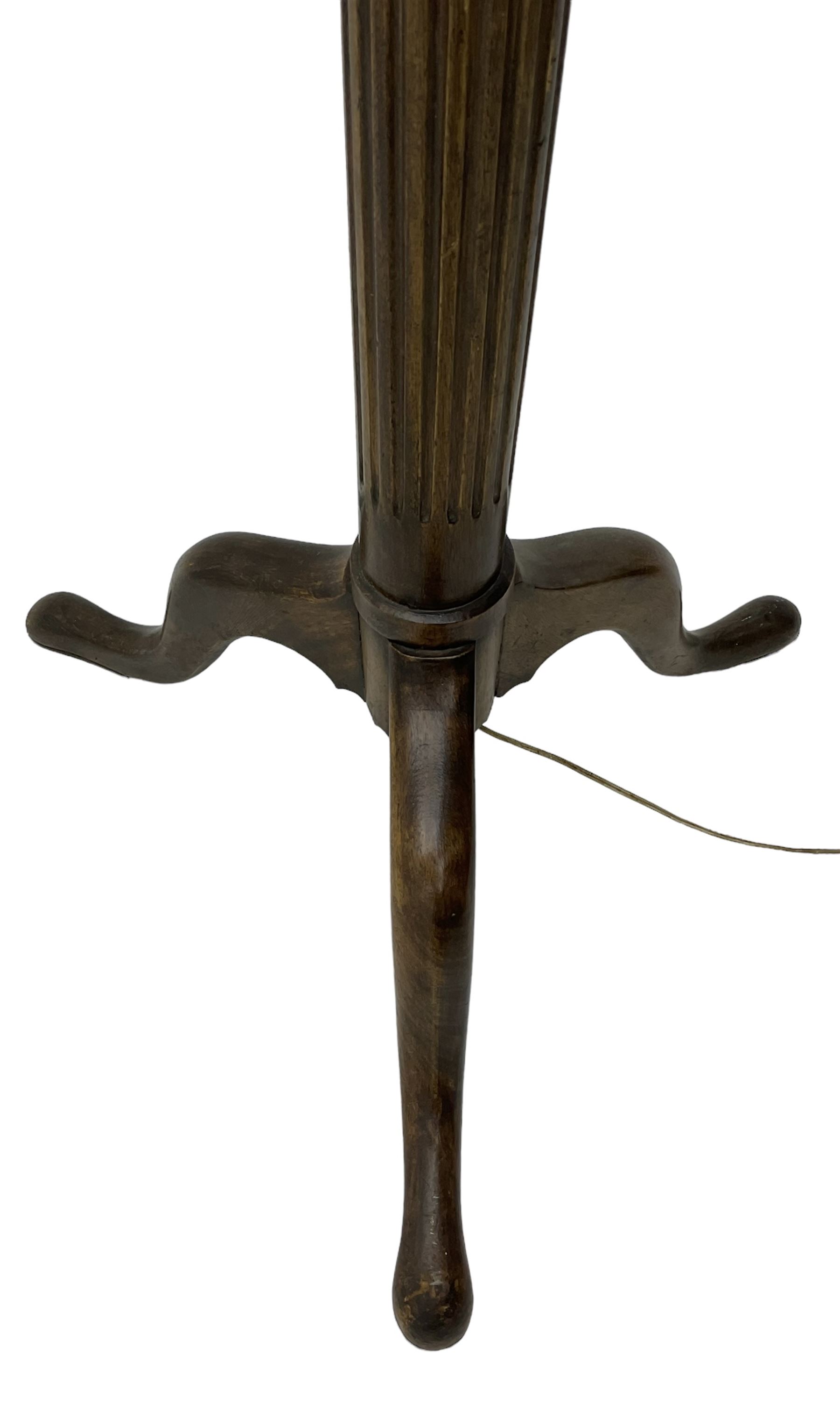 20th century mahogany standard lamp, fluted column on tripod base, with shade 