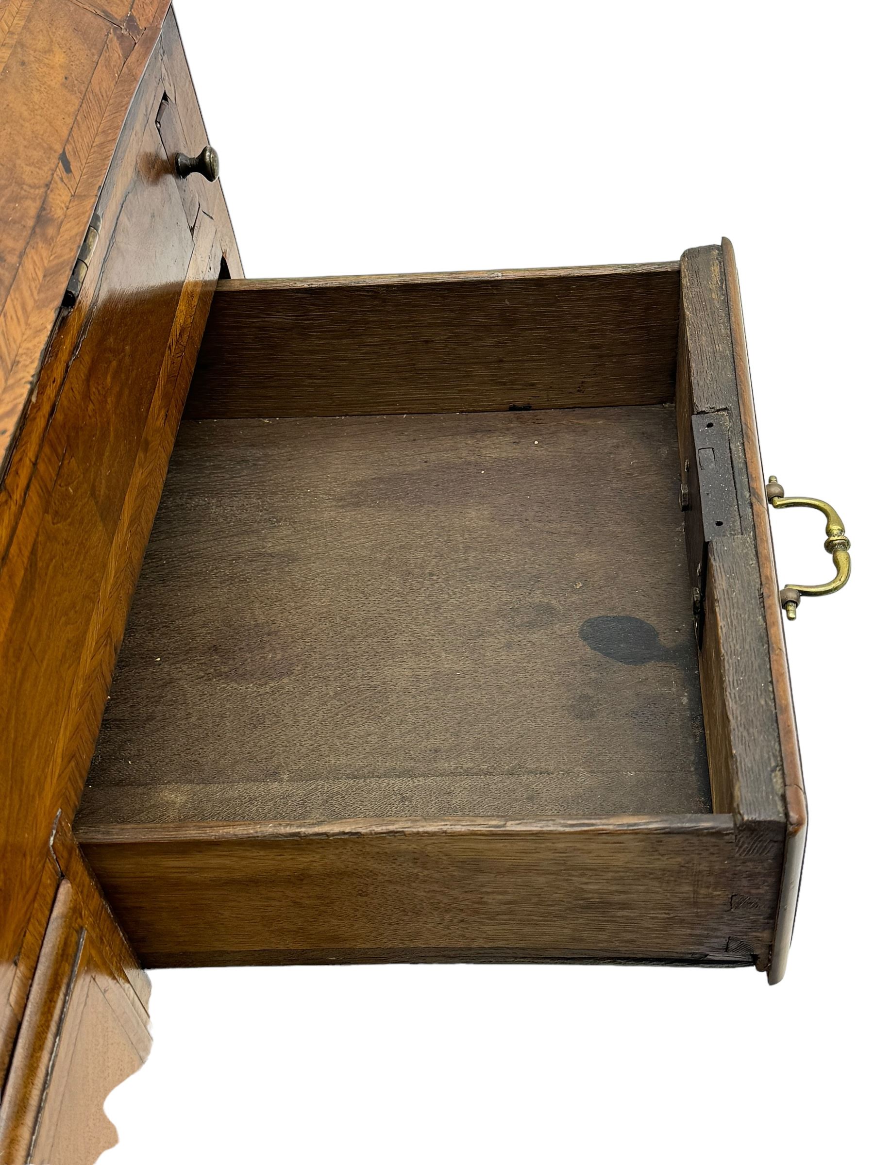 18th century walnut bureau, fall-front enclosing fitted interior with drawers and pigeonholes, over two short and two long drawers with brass escutcheon plates and handles, raised on bracket feet