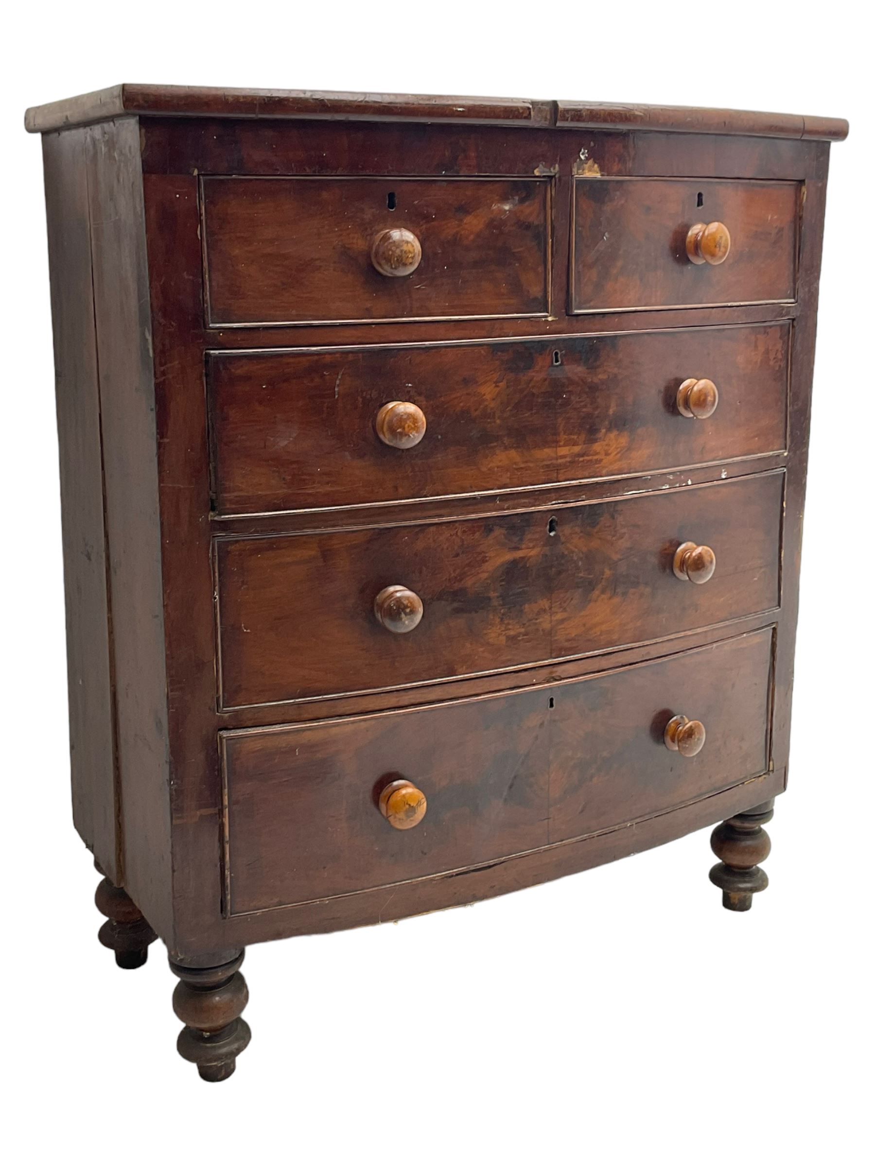 Victorian mahogany bow-front chest, fitted with two short and three long drawers, on turned feet