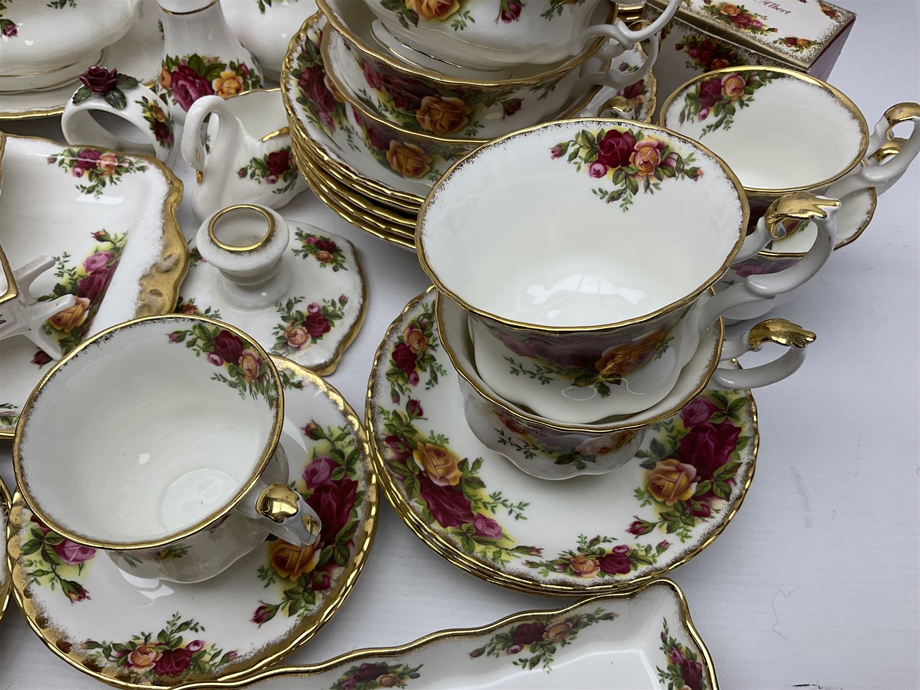 Royal Albert Old Country Roses pattern coffee service for six, comprising coffee pot, milk jug, cups and saucers, cake plate, together with miniature teapot, six teacups and saucers, six dinner plates, six side plates etc 