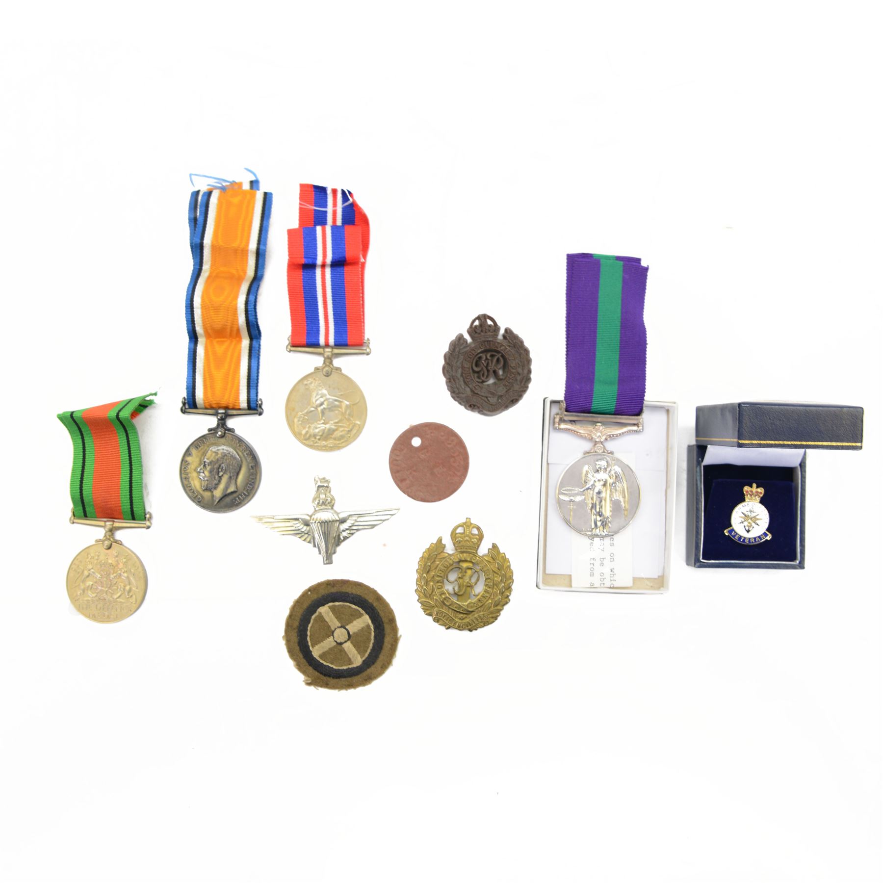 WWI British War medal, WWII Defence medal and War medal and General Service medal with Palestine 1945-48 clasp, awarded to 14895524 DVR K J Coultas RE together with other military badges 