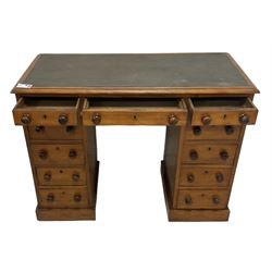 Victorian mahogany twin pedestal desk, rectangular top with inset green leather writing surface, fitted with central frieze drawer flanked by five graduating drawers on each side 