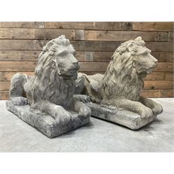 Pair of large cast stone Langport recumbent garden lions, rectangular plinth base