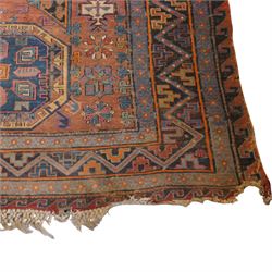 Old Persian red ground flat woven carpet, the field with three large medallions surrounded by small stylised flower head motifs, geometric border enclosed within running water band 346