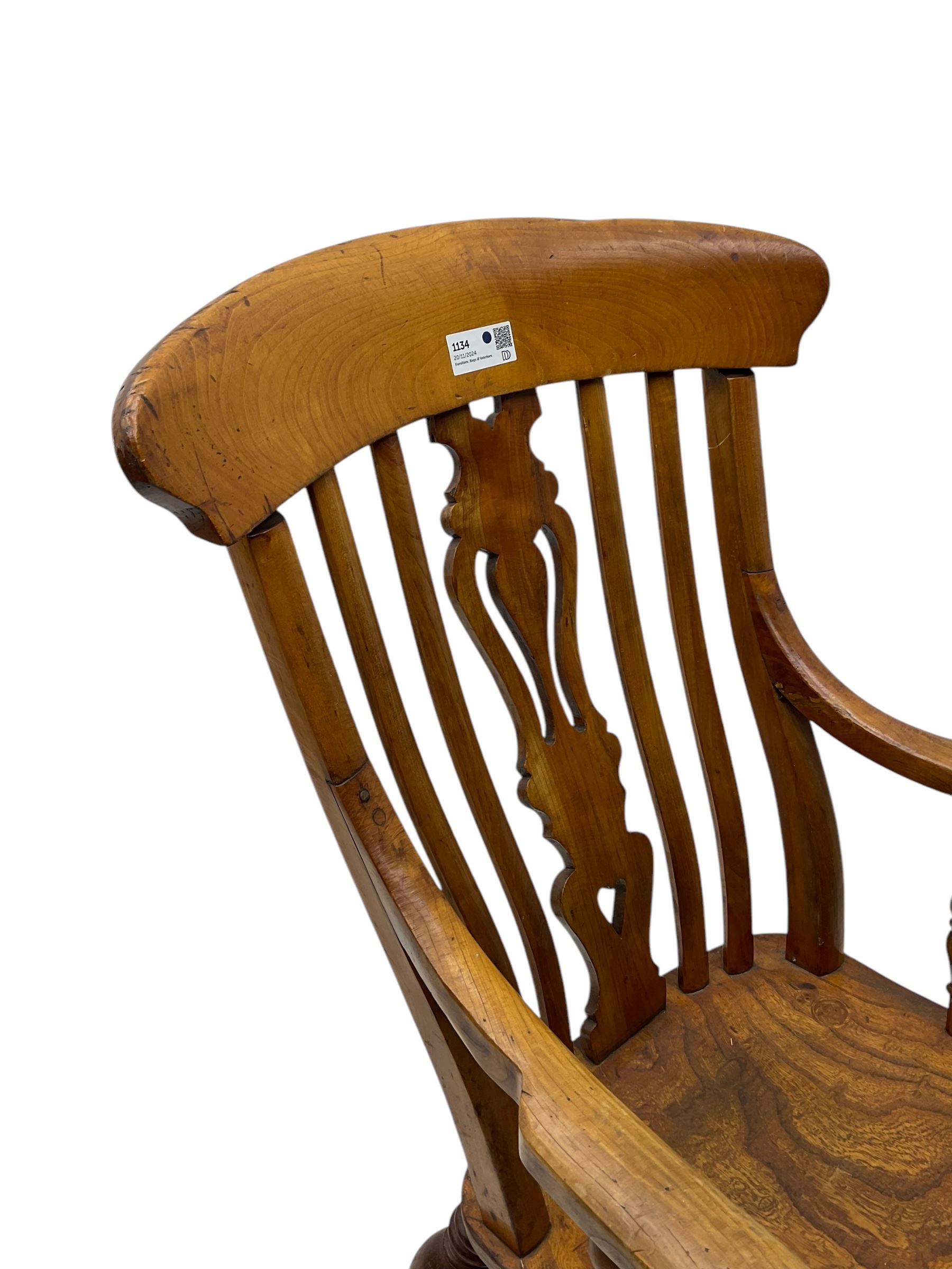 Late 19th century elm and ash comb-back Windsor chair, shaped back with pierced vase-shaped central splat and spindle supports, shaped saddle seat raised on turned supports united by H-stretcher