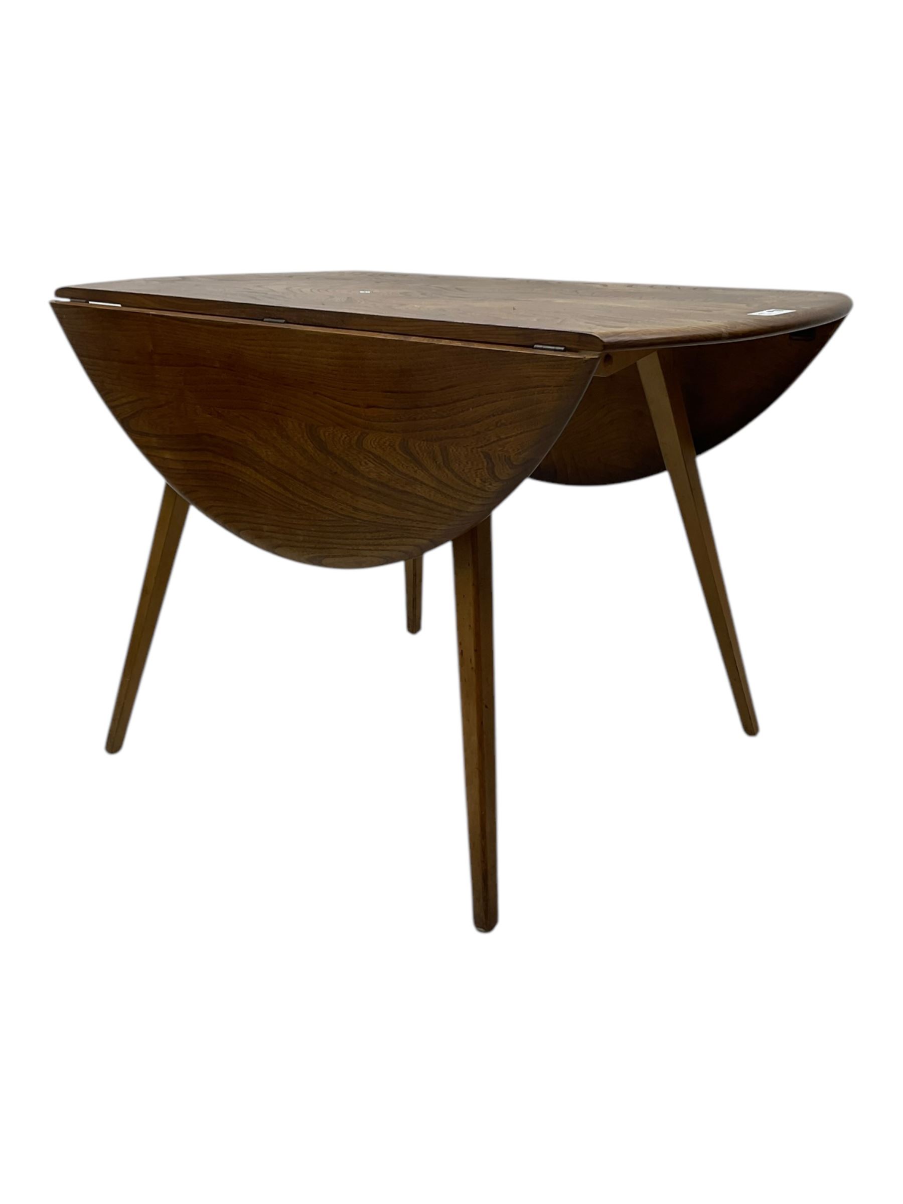 Lucian Ercolani for Ercol - 1960s elm and beech dining table, drop-leaf oval top, on splayed square tapering supports