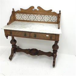 Victorian mahogany washstand, raised shaped back, marble top, two drawers, turned supports joined by single stretcher on arched supports, W107cm, H113cm, D50cm