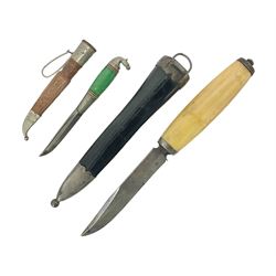 Two Scandinavian bowie knives, the first example with polished green handle with horse head final in white metal, with brown leather sheath, blade L6cm overall L12cm, the second with a polished bone handle, in black sheath with white metal tip, blade L11cm overall 23cm