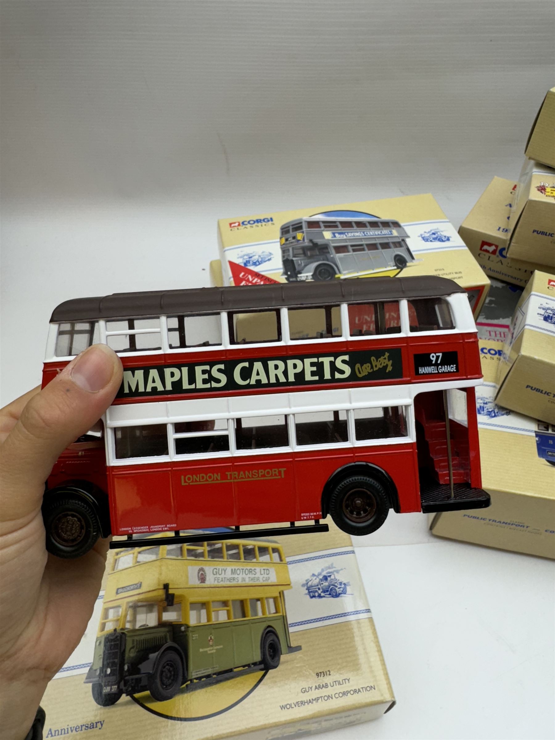 Fifteen limited edition Corgi Classic Public Transport vehicles, together with a 10th Anniversary Corgi Collector Club Scammell Scarab, Routemasters in Exile The North four bus collection and a Classic Commercials Bedford OB Edinburgh, all boxed with certificates (18)