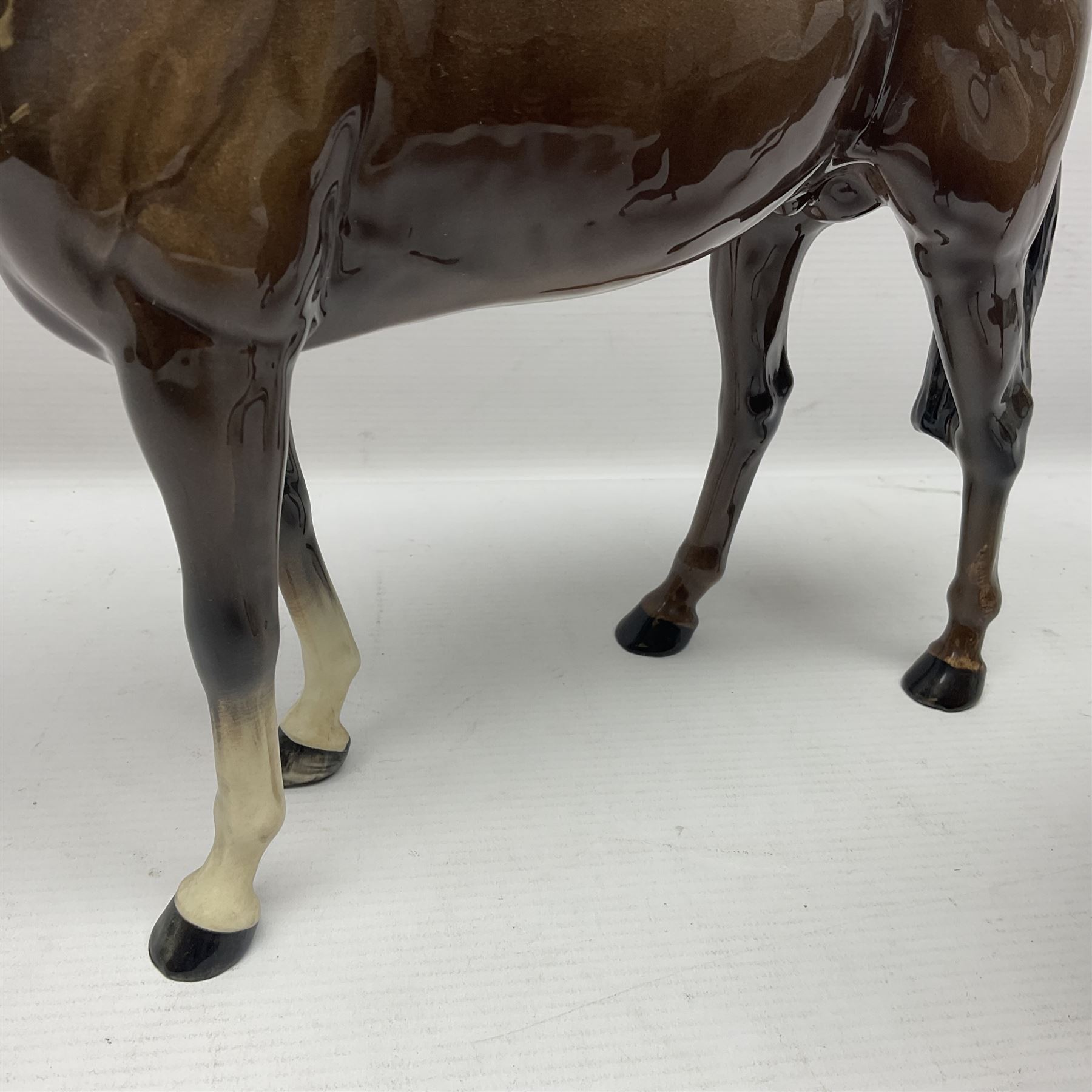 Beswick bay race horse no 1564, together with Royal Doulton bay horse