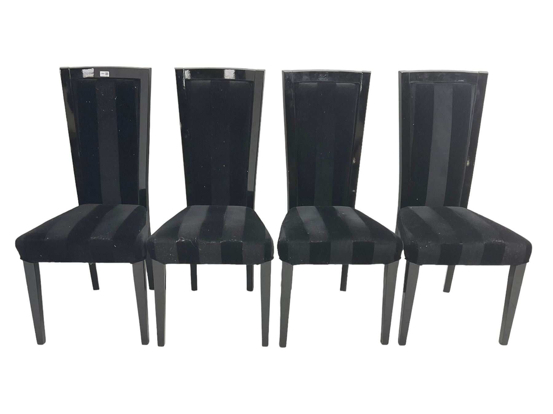 Set of four contemporary ebonised high back dining chairs, upholstered in black velvet fabric