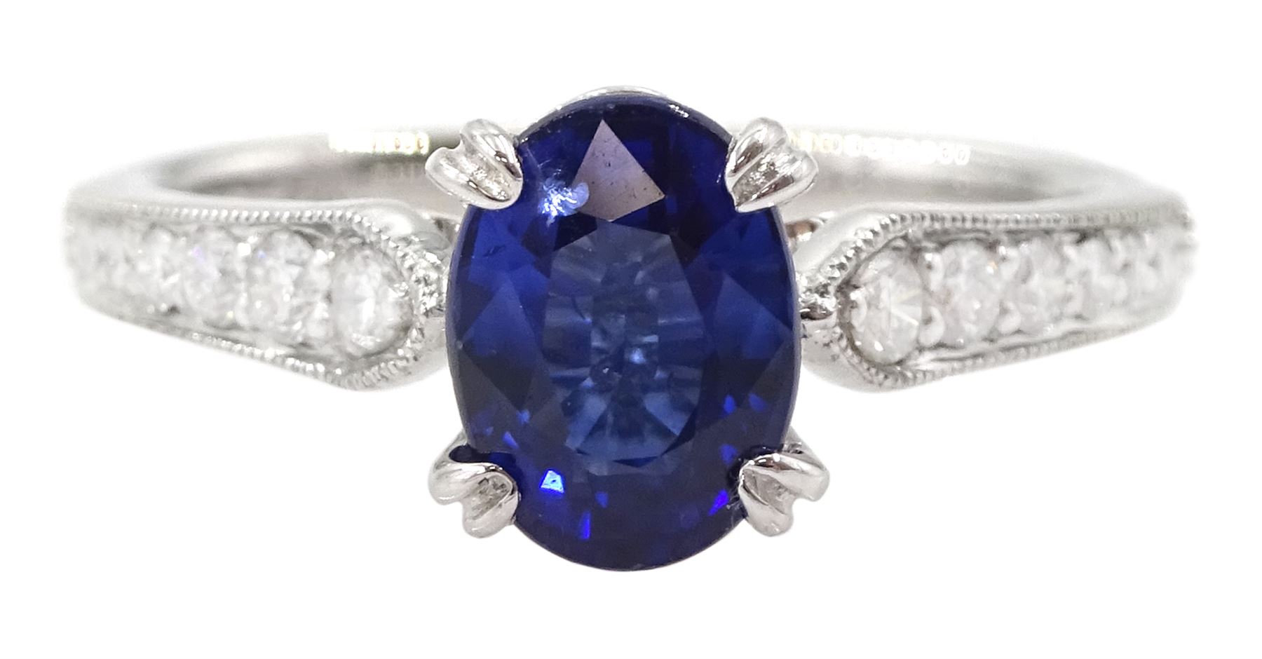 18ct white gold oval cut sapphire ring, with milgrain set round brilliant cut diamond shoulders, hallmarked, sapphire approx 0.80 carat, total diamond weight approx 0.40 carat