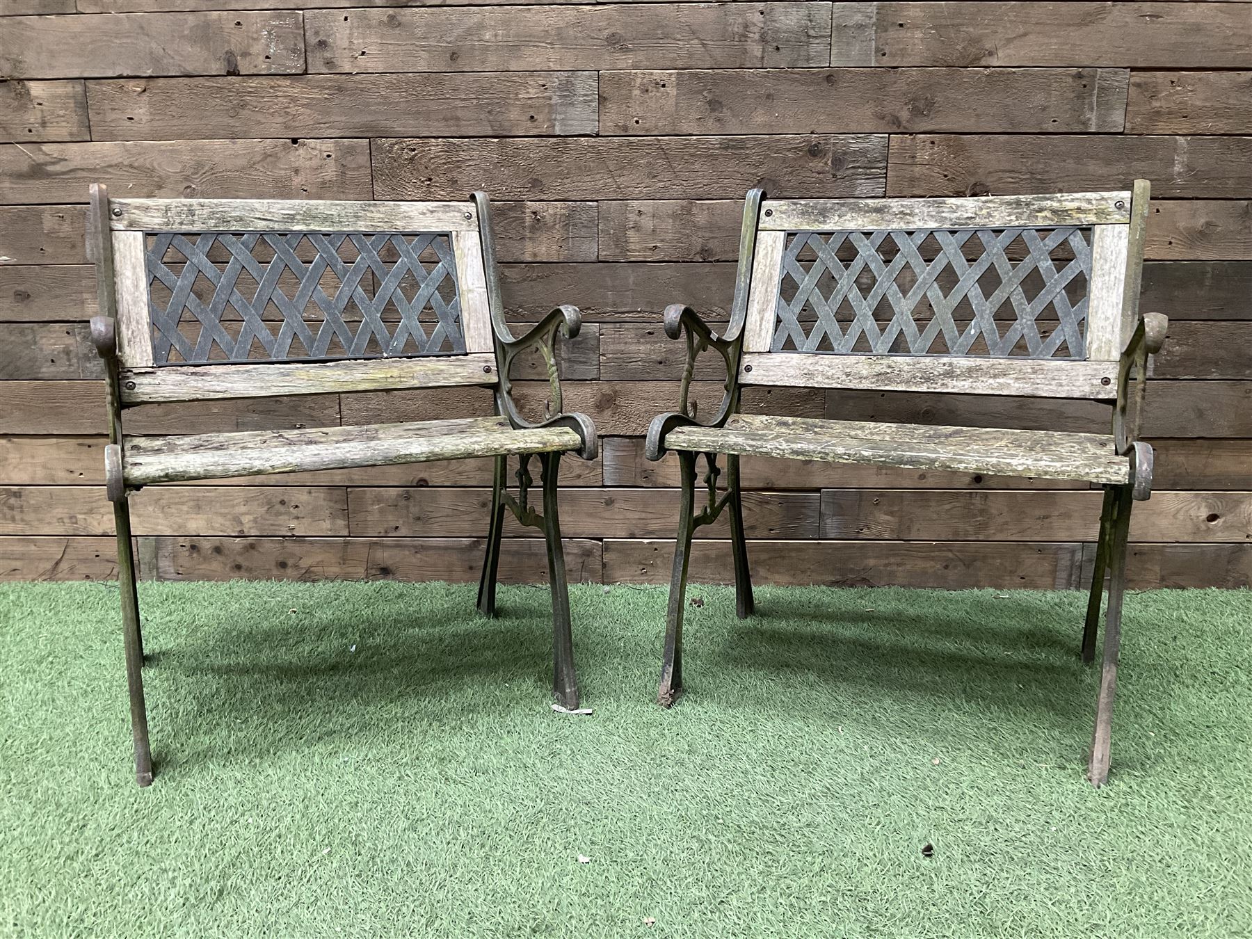 Pair of cast iron and wood slatted garden bench seats - THIS LOT IS TO BE COLLECTED BY APPOINTMENT FROM DUGGLEBY STORAGE, GREAT HILL, EASTFIELD, SCARBOROUGH, YO11 3TX