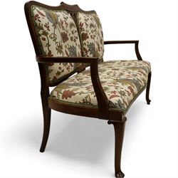 Edwardian mahogany framed two seat settee, upholstered in cream foliate fabric