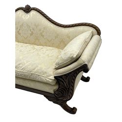 Victorian design walnut framed settee, shaped camelback with gadroon carved edge and central feather motif, upholstered in cream damask fabric with scrolling floral pattern, S-scroll arm facias carved with flower head and curled leaves, feather carved C-scroll splayed feet 