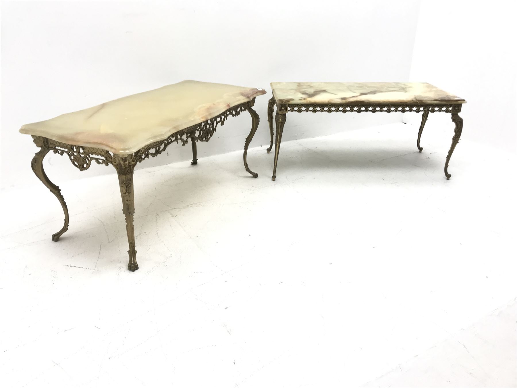 Two vintage onyx coffee tables on ornate gilt metal bases, shaped top table - 111cm x 52cm, H50cm, rectangular top table - 101cm x 50cm, H45cm