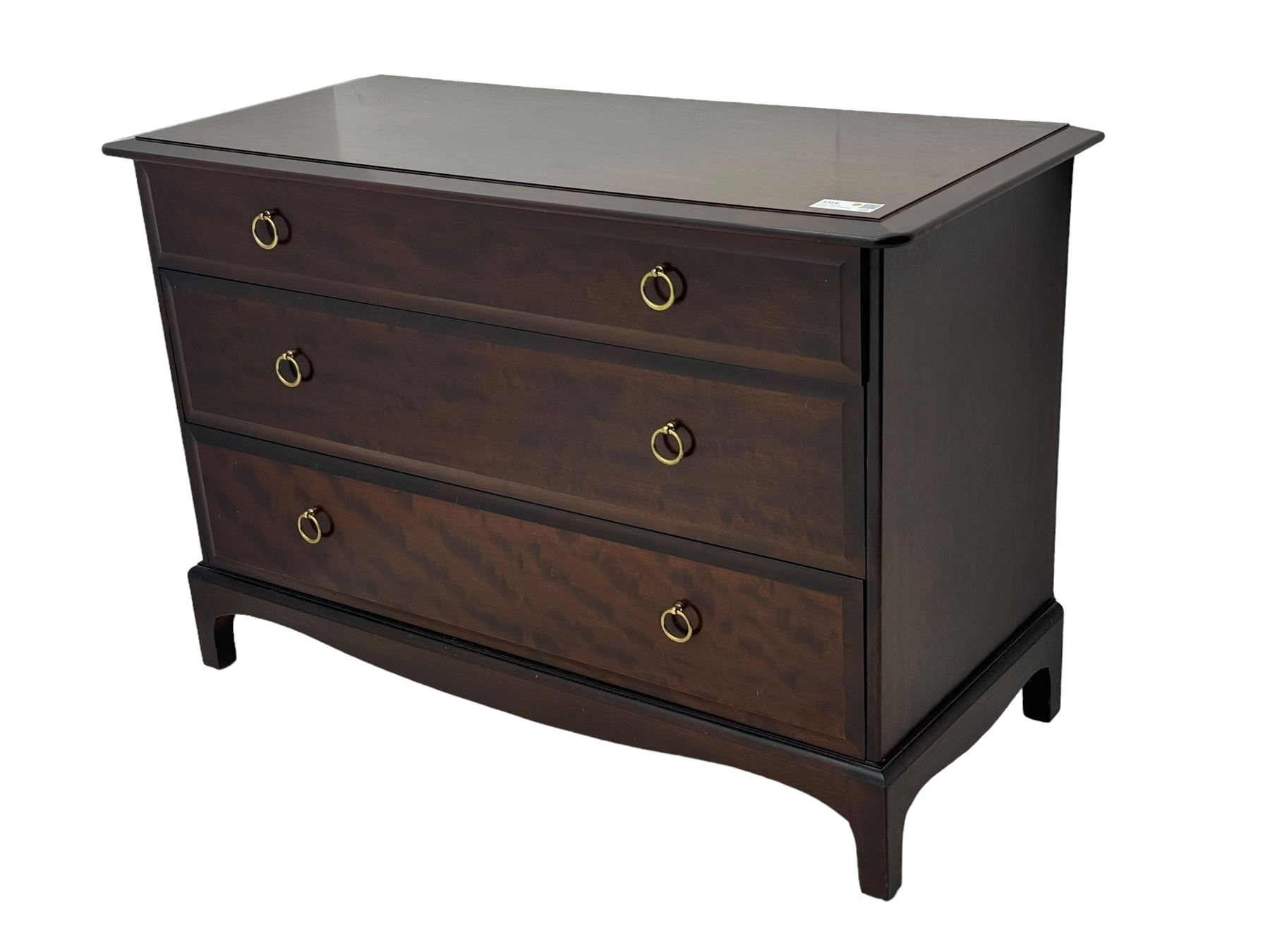 Stag Minstrel - mahogany chest of drawers, rectangular top over three drawers with brass ring pulls, on bracket feet