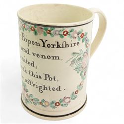 Early 19th century Sunderland creamware frog mug, hand painted with verse 'John Ingleby Ripon Yorkshire, Tho' malt and venom, seem united; Don't break this Pot, nor be affrighted', within a painted wreath and black borders, H14cm 