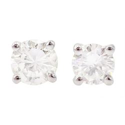 Pair of 18ct white gold round brilliant cut diamond stud earrings, stamped 750, total diamond weight approx 0.50 carat