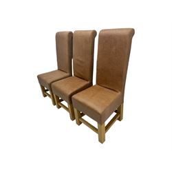 Set of six contemporary light oak dining chairs, each with high back and seat upholstered in pale tan leather, on square supports connected by H-stretcher