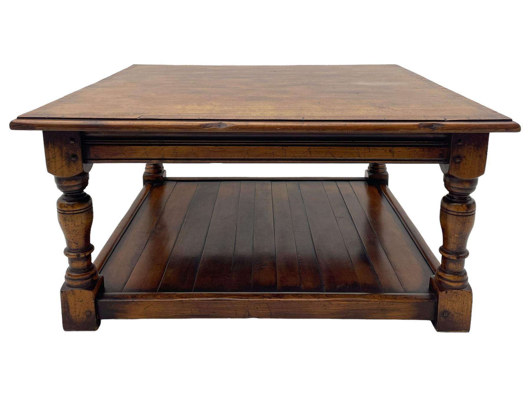 Square elm coffee table, square ovolo-moulded top with fruitwood band, turned supports united by undertier 