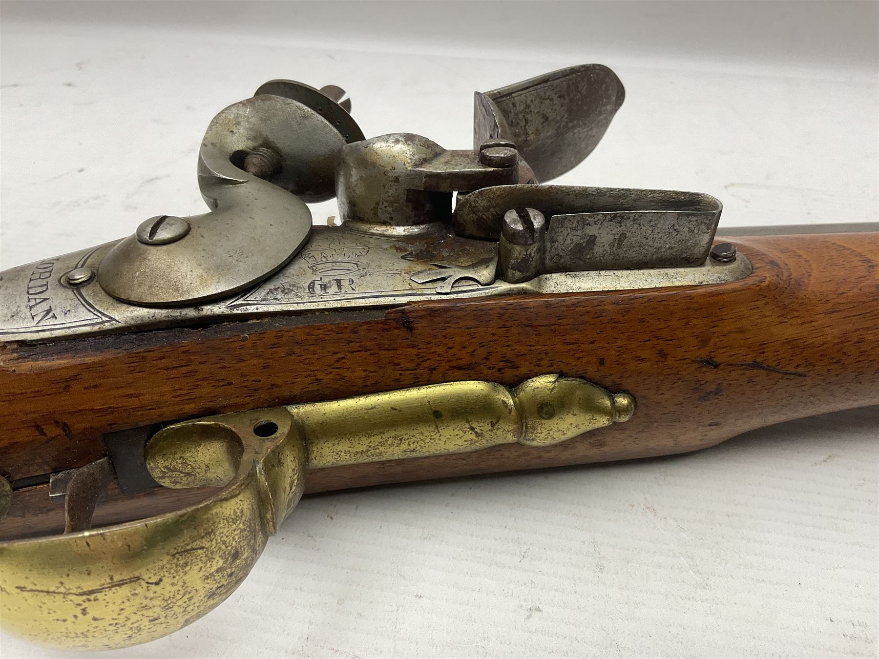 Brown Bess style 10-bore flintlock musket, the action marked with Crowned GR, 'Jordan' and dated 1758, the 104cm(41