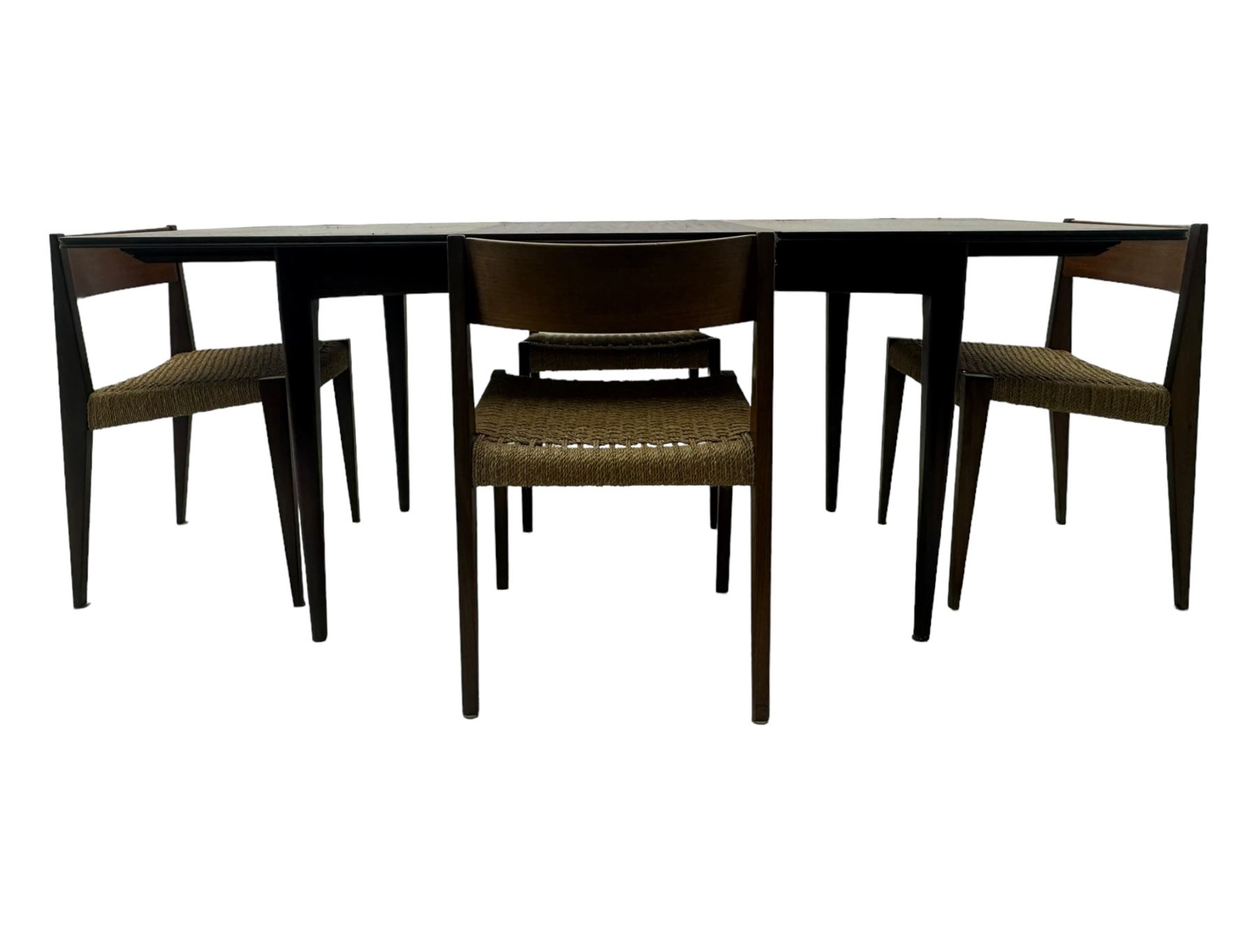 Mid 20th century Danish teak extending dining table, rectangular top with contrasting central draw leaf, on tapered supports; with four teak dining chairs with string seats