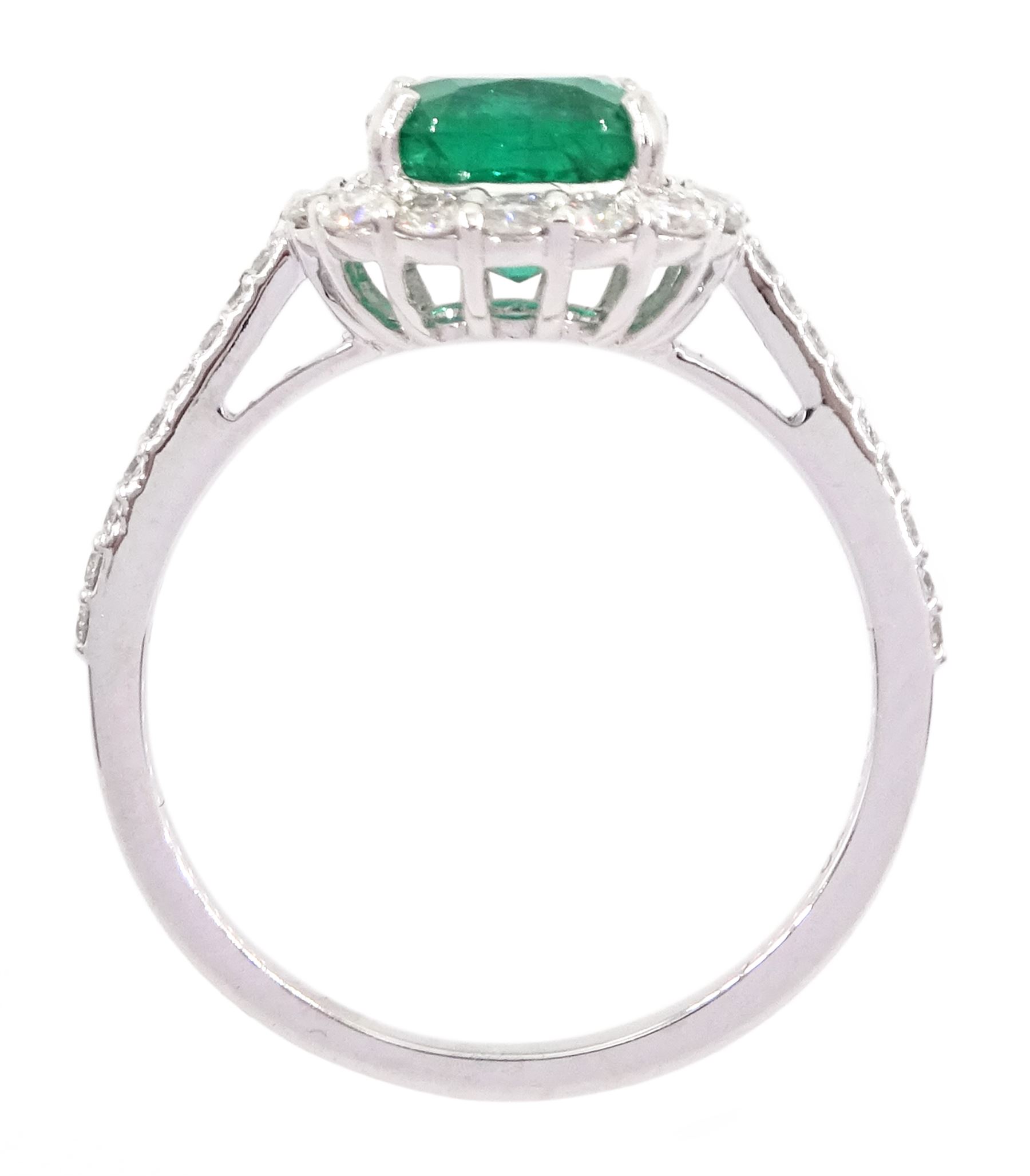 18ct white gold cushion cut emerald and round brilliant cut diamond cluster ring, stamped 750, emerald approx 1.85 carat, total diamond weight approx 0.55 carat