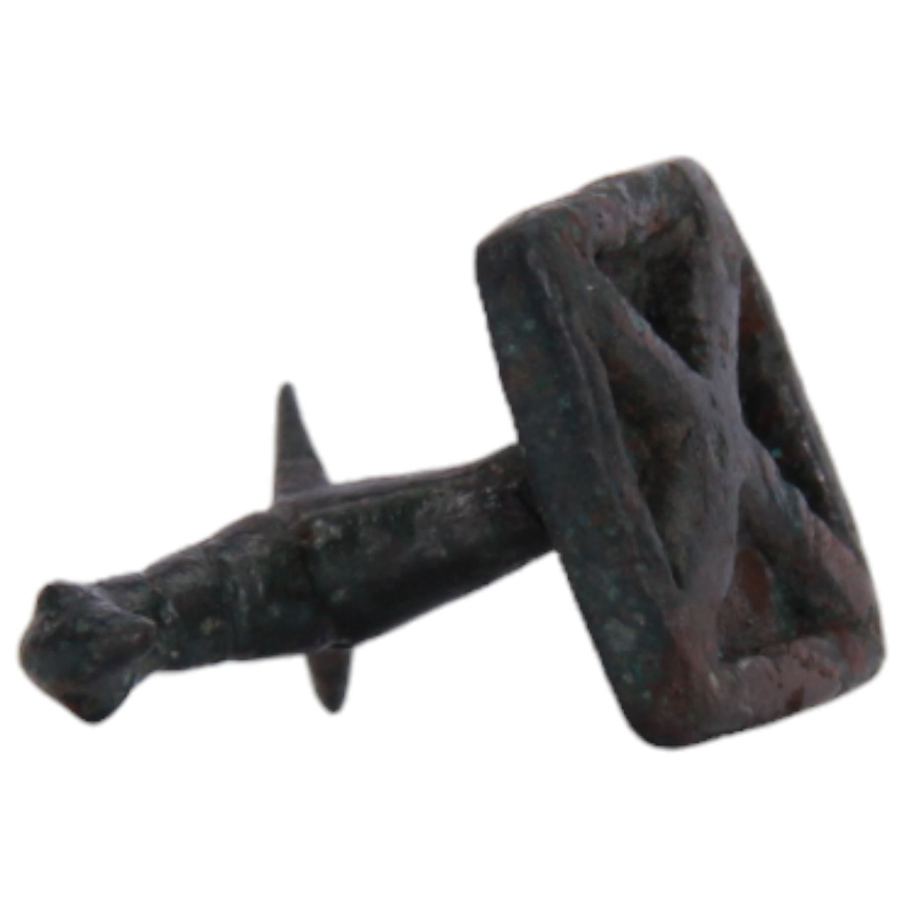 Greek bronze seal votive, probably Geometric period, modelled in the form of a bird, upon square base with X seal beneath, 2.5cm