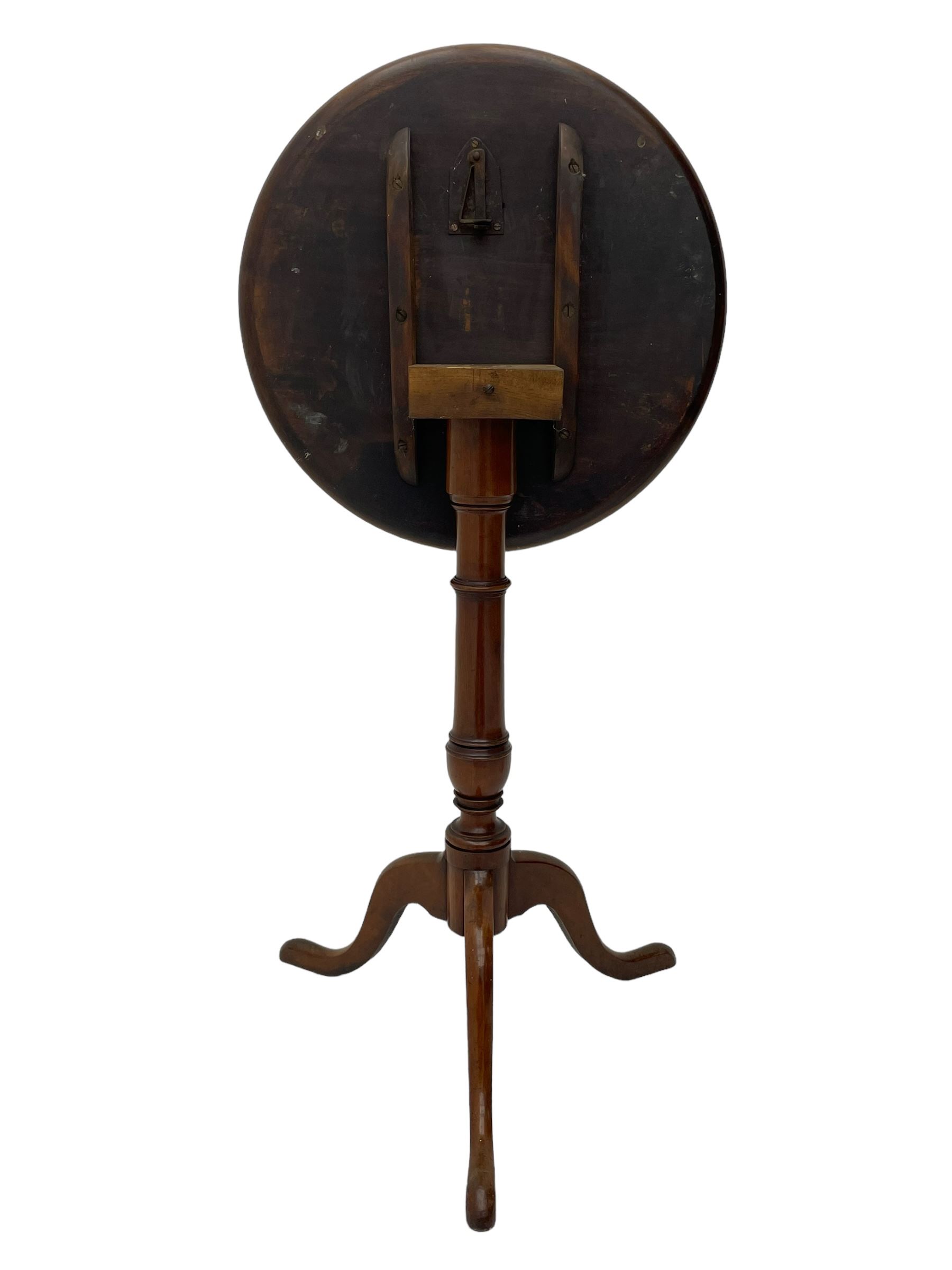 George III mahogany tripod table, circular moulded dished tilt-top, ring turned stem on three splayed supports 