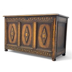 Jacobean design oak blanket box, carved geometric frieze and three-panelled front, each pa...