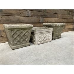 Pair of square cast stone planters, single planter with leaf decoration and a rectangular brick effect planter (4)