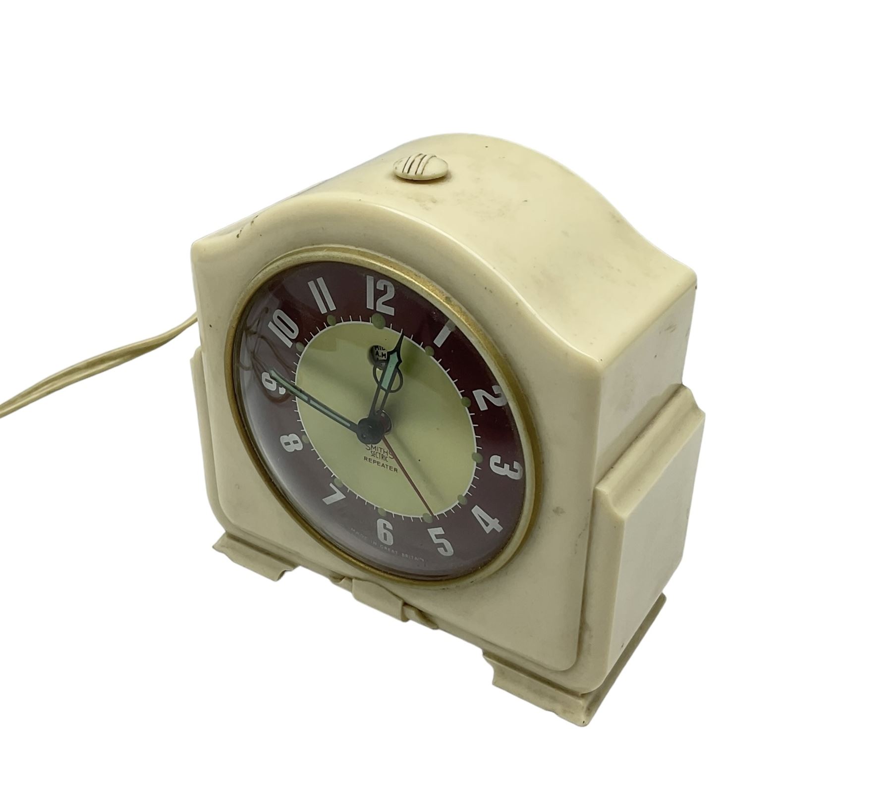 Smiths - Two 1950's Smiths mains operated Sectric clocks in Bakelite cases. Circular office wall clock with Arabic numerals and spade hands inscribed LNER. Ivory Bakelite cased mantle clock with alarm and repeat function.