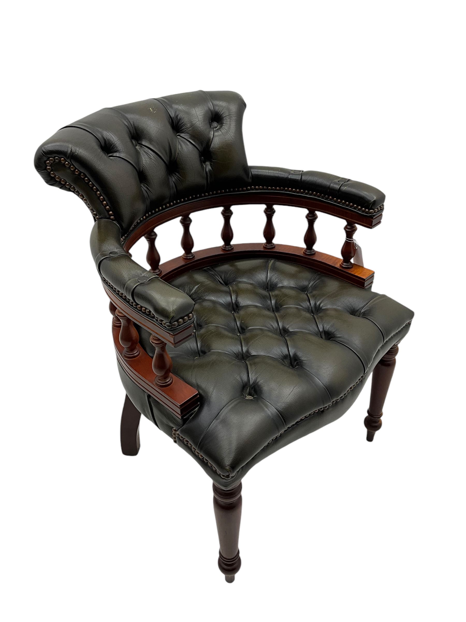 Captain's standard desk chair, upholstered in studded green leather