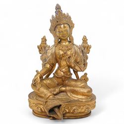 Siamese gilded bronze model depicting the Buddhist goddess Tara seated on a throne, H22cm