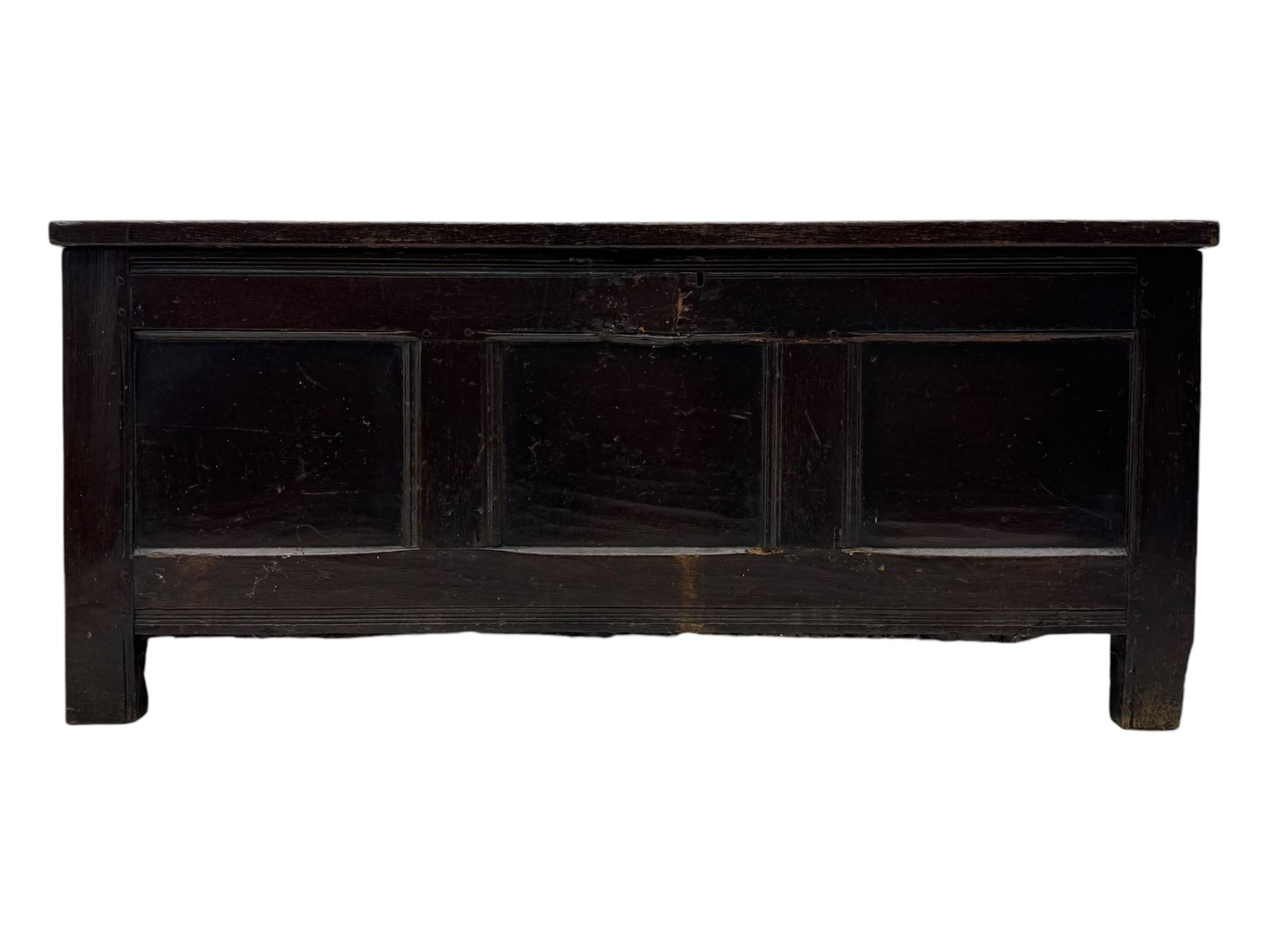 18th century oak blanket box, panelled hinged lid over panelled front, moulded frame, on stile supports 