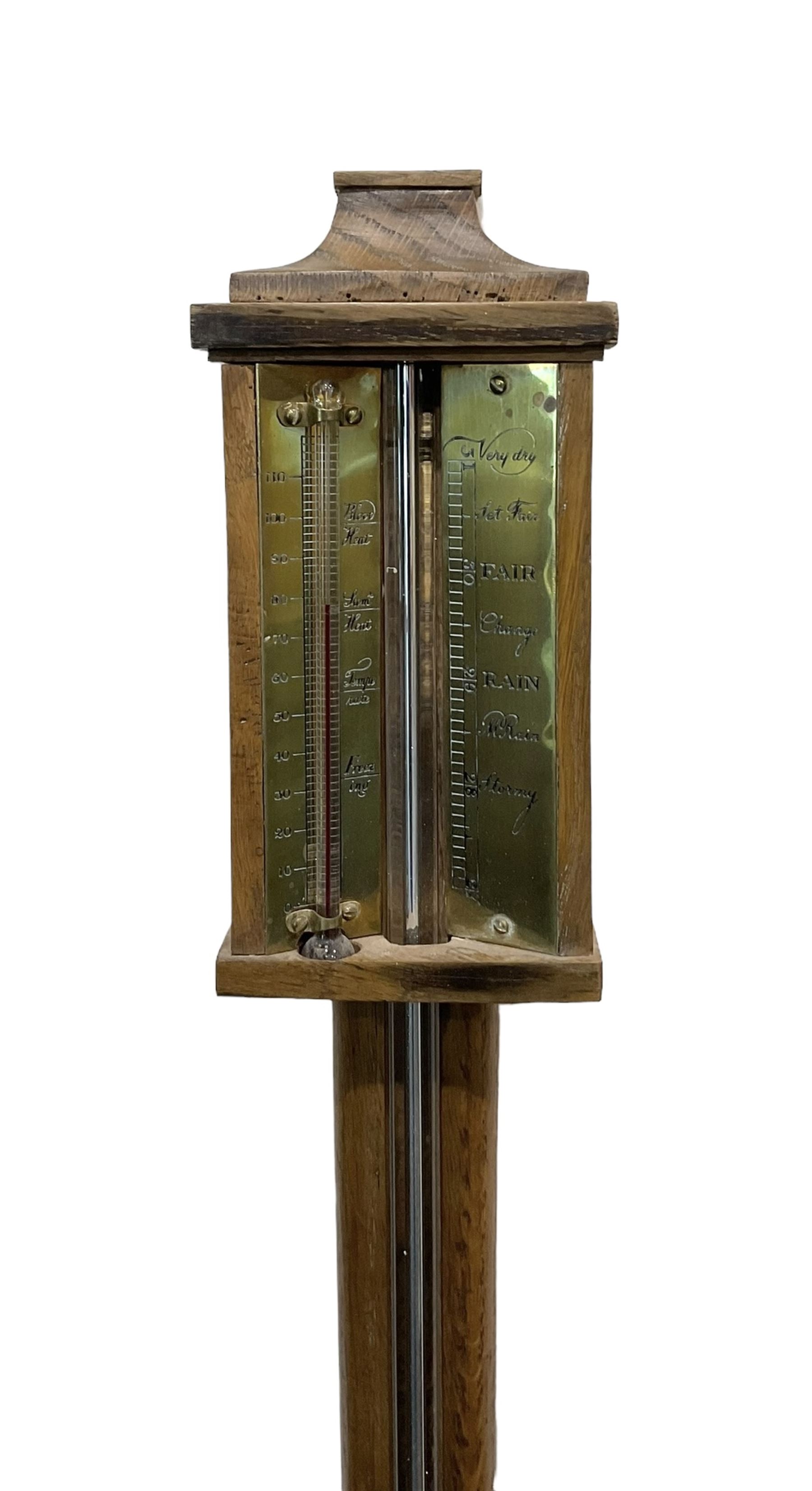 Replica 18th century mercury stick barometer, with a plain concave shaped top and square cistern cover, fully exposed cistern tube and engraved brass register with predictions, spirit thermometer recording the temperature in degrees Fahrenheit.